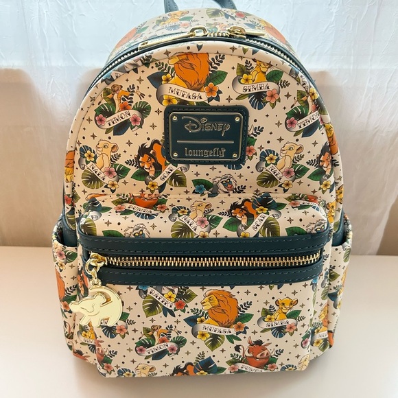 Loungefly Handbags - Loungefly Lion King Mini Backpack Tattoo AOP new